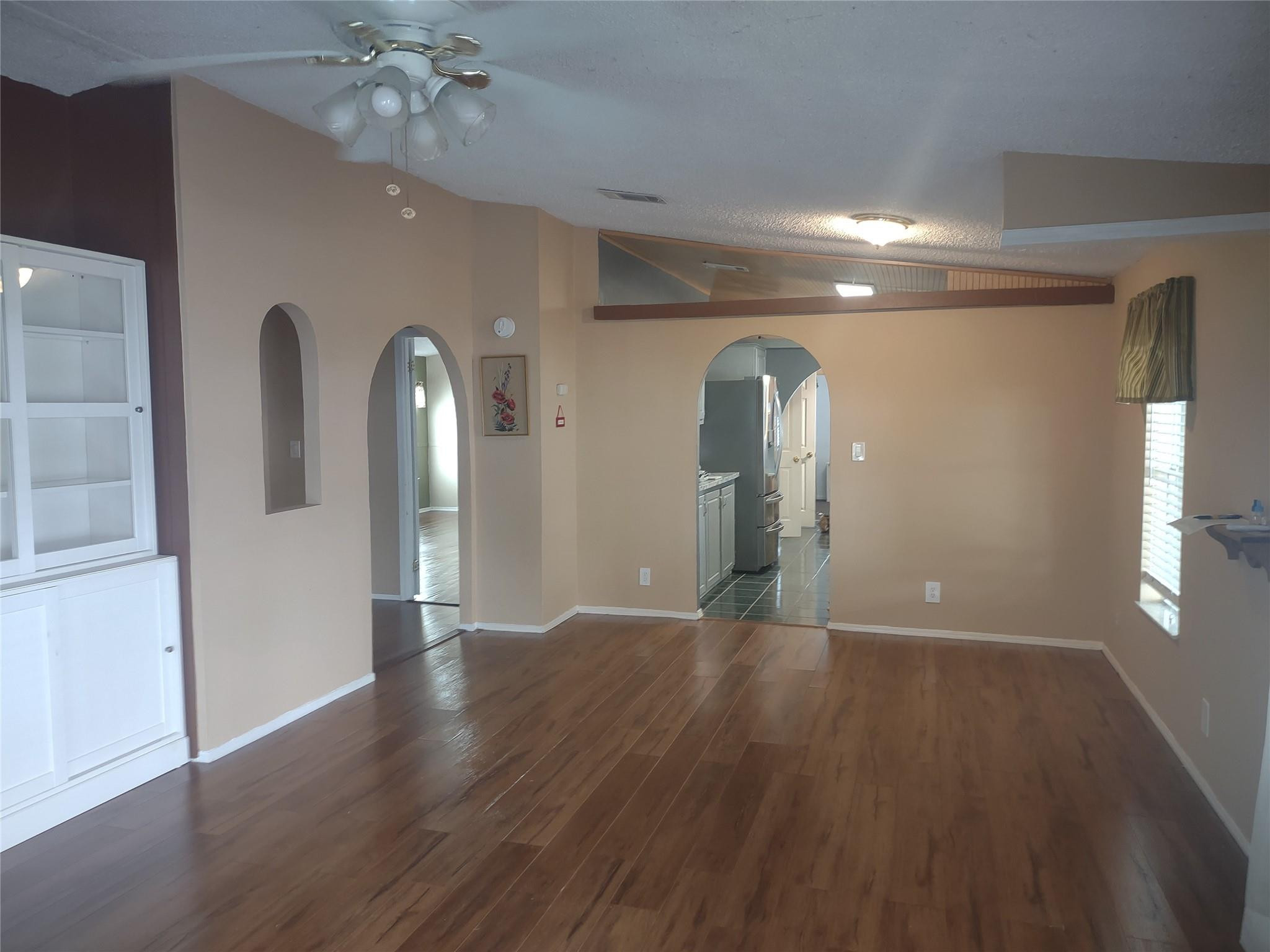 1576 Southwest 35th Circle Okeechobee, FL 34974 - Photo 9 of 42 a view of a livingroom with wooden floor