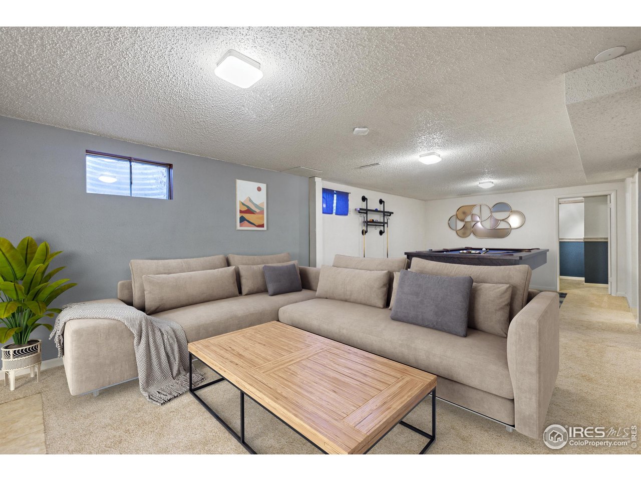725 South 45th Street Boulder, CO 80305 - Photo 29 of 44 a living room with furniture and a lamp