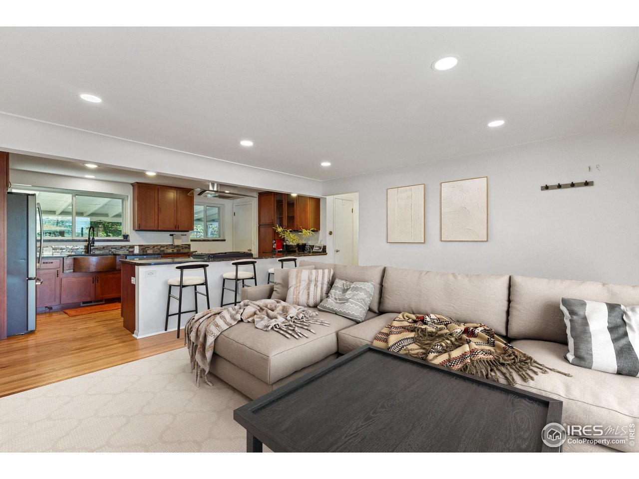 725 South 45th Street Boulder, CO 80305 - Photo 5 of 44 a living room with furniture and kitchen view