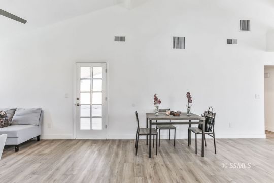 832 Walker Lane Ridgecrest, CA 93555 - Photo 8 of 23 a workspace with furniture and wooden floor