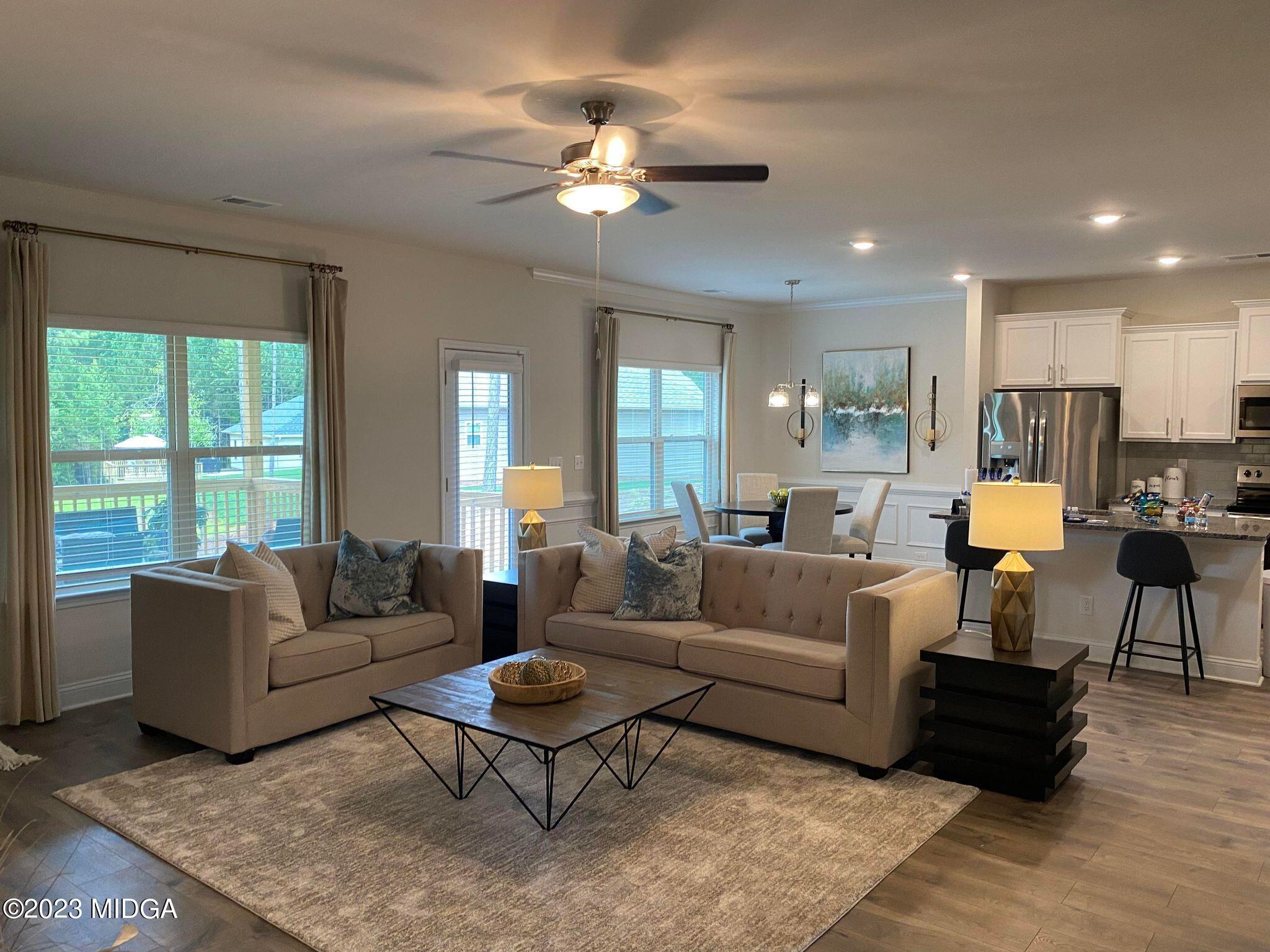 612 Britton Way, Unit 70 Macon, GA 31216 - Photo 14 of 18 a living room with furniture and a large window