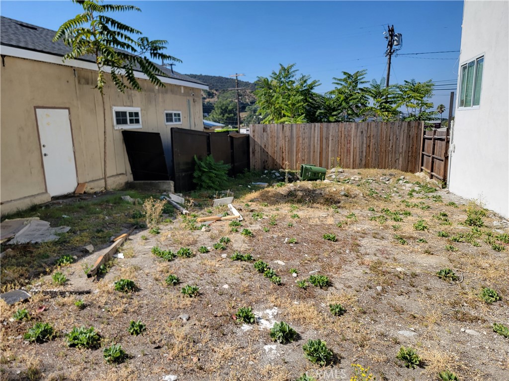 9939 Commerce Avenue Tujunga, CA 91042 - Photo 9 of 12 a backyard of a house