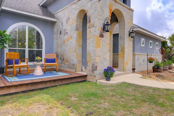 a backyard of a house with seating space