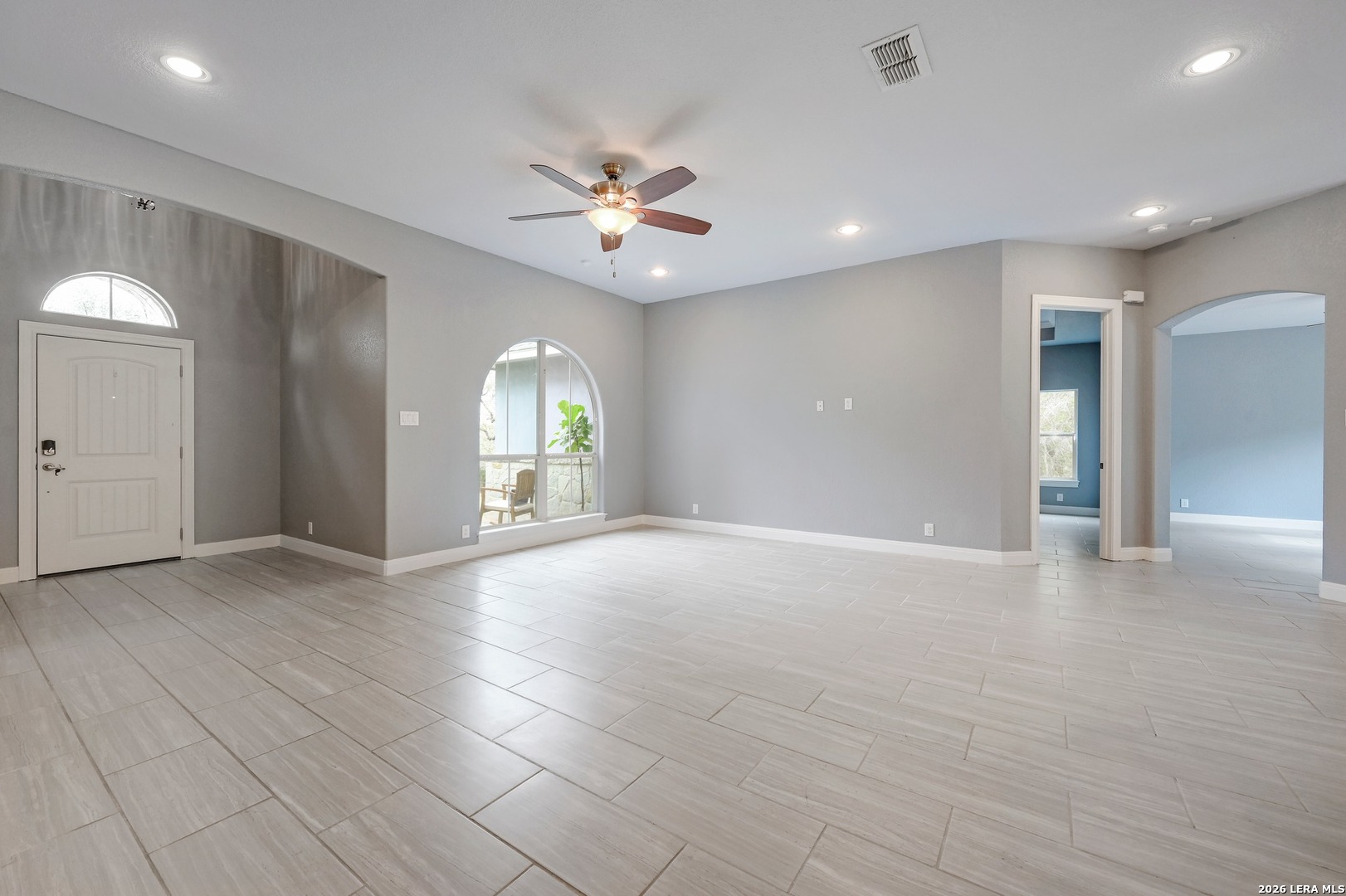 1134 Victoria Spring Branch, TX 78070 - Photo 6 of 28 an empty room with fan and entrance door