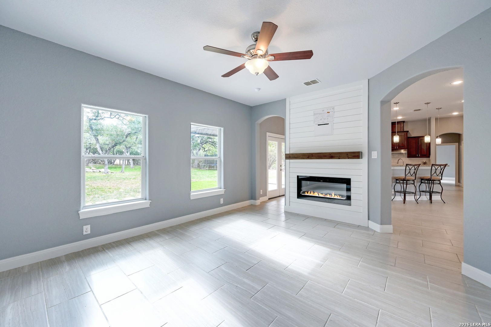 1134 Victoria Spring Branch, TX 78070 - Photo 10 of 28 a view of a livingroom with a fireplace and window