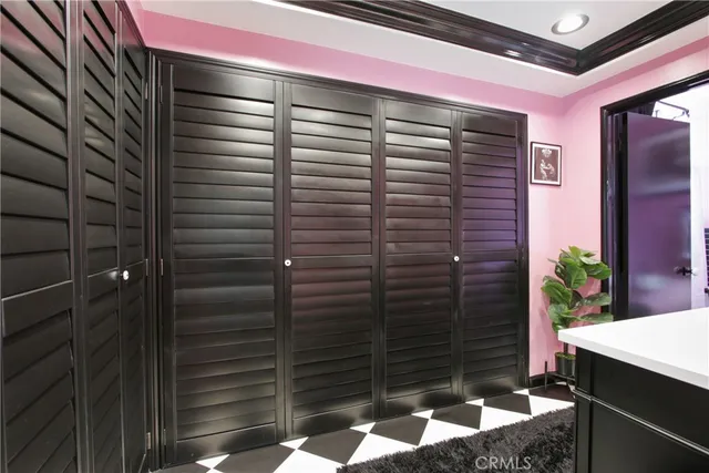 a bathroom with a granite countertop sink and shower