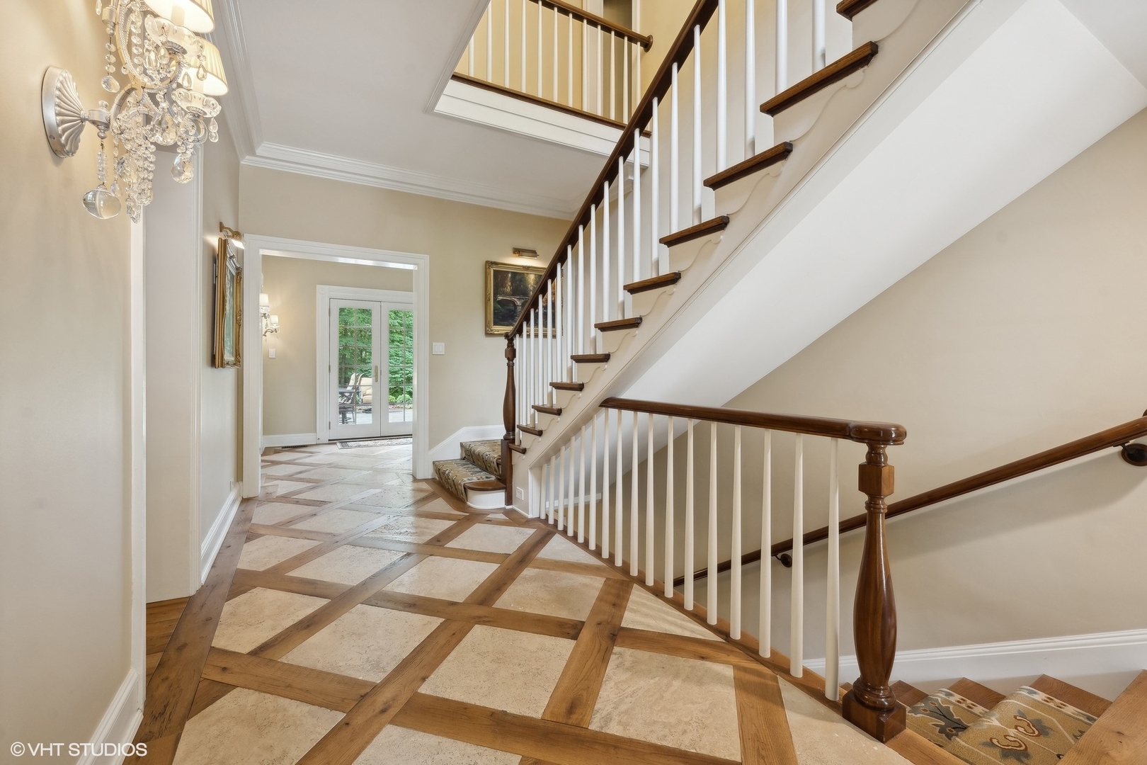 875 Country Club Road St. Charles, IL 60174 - Photo 27 of 96 a view of staircase with wooden floor and a rug