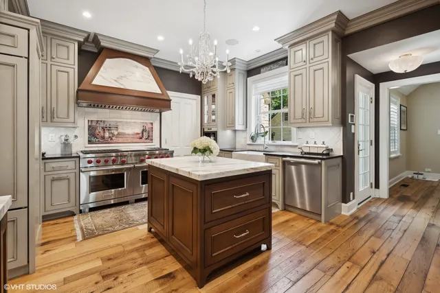 a spacious bedroom with a bed and a large window
