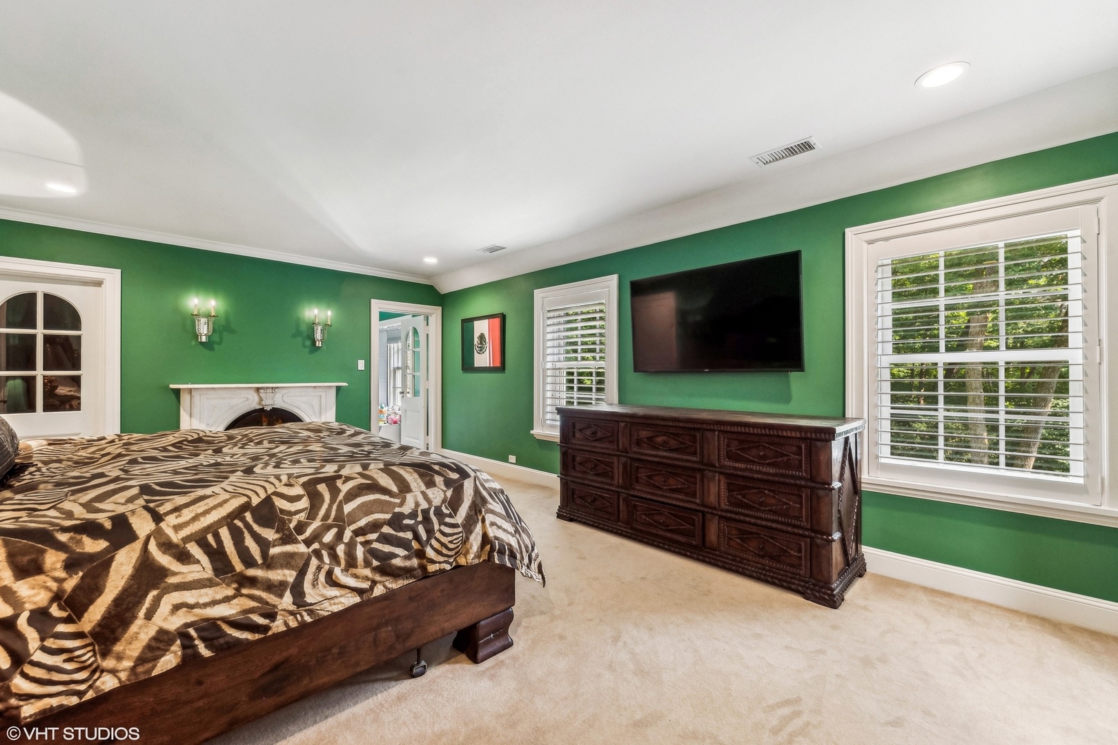 875 Country Club Road St. Charles, IL 60174 - Photo 69 of 96 a bedroom with a bed and a flat screen tv