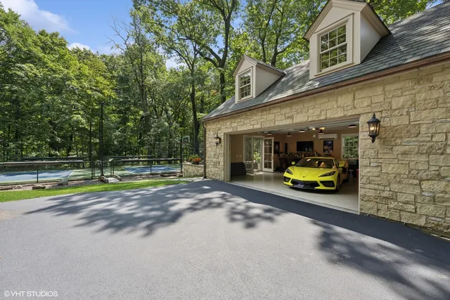 a view of a park with trees and bushes