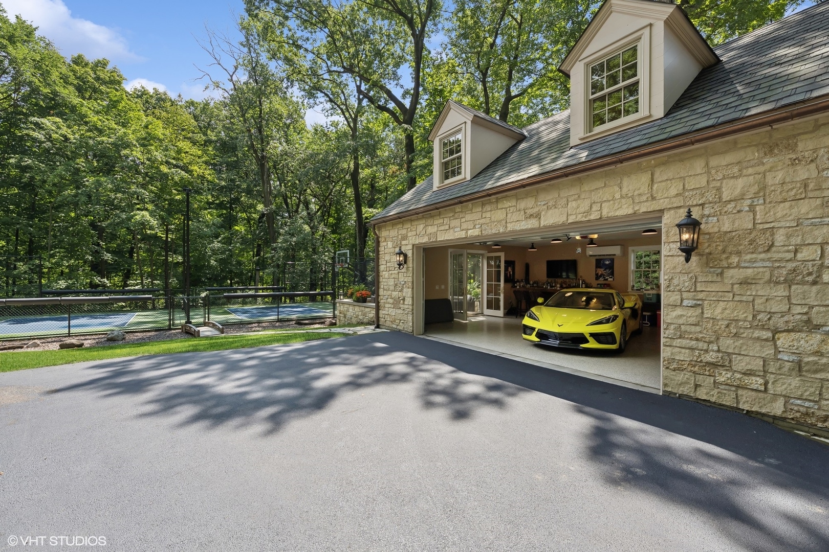 875 Country Club Road St. Charles, IL 60174 - Photo 7 of 96 a view of a house with a swimming pool and furniture