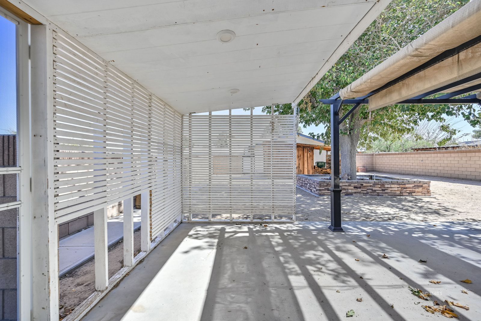 1572 North Calvert Boulevard Ridgecrest, CA 93555 - Photo 21 of 27 a view of a pathway with a house