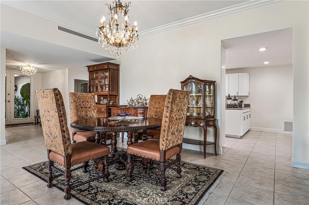 19 Cornell Drive Rancho Mirage, CA 92270 - Photo 4 of 22 a view of a dining room with furniture