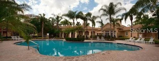 a view of a yard with palm trees