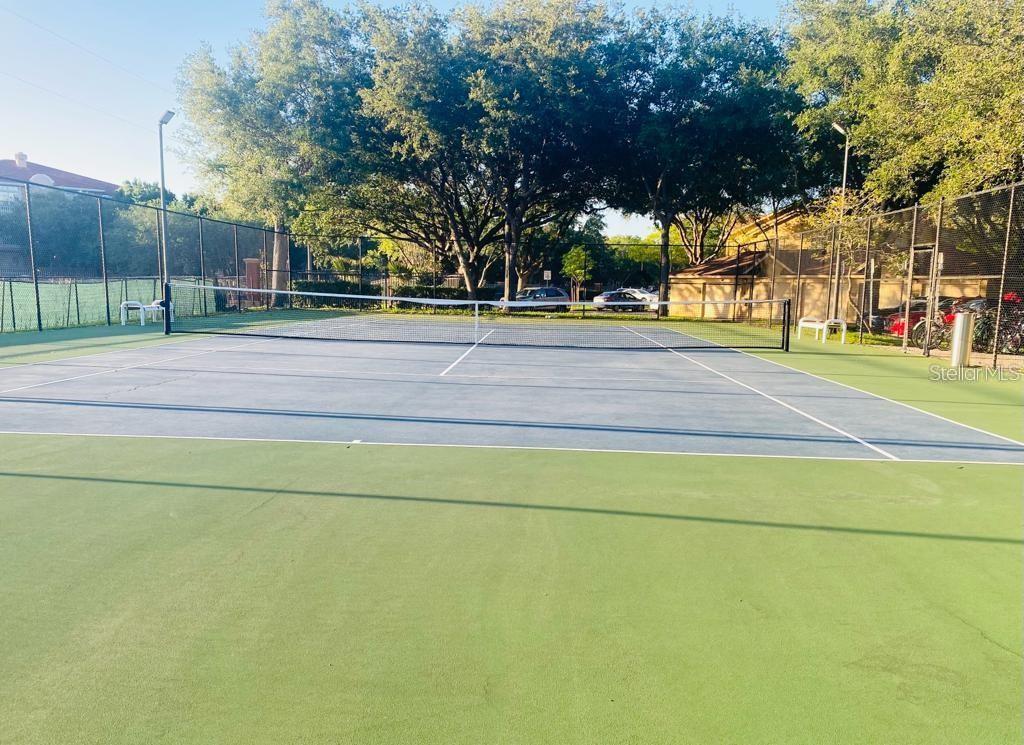 835 Grand Regency Pointe, Unit 205 Altamonte Springs, FL 32714 - Photo 18 of 18 a view of a yard with basketball court