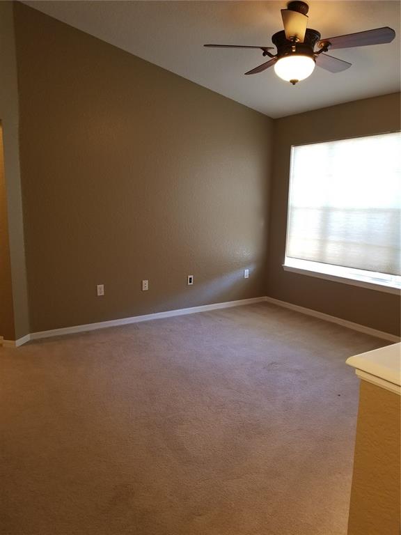 835 Grand Regency Pointe, Unit 205 Altamonte Springs, FL 32714 - Photo 10 of 18 an empty room with a window