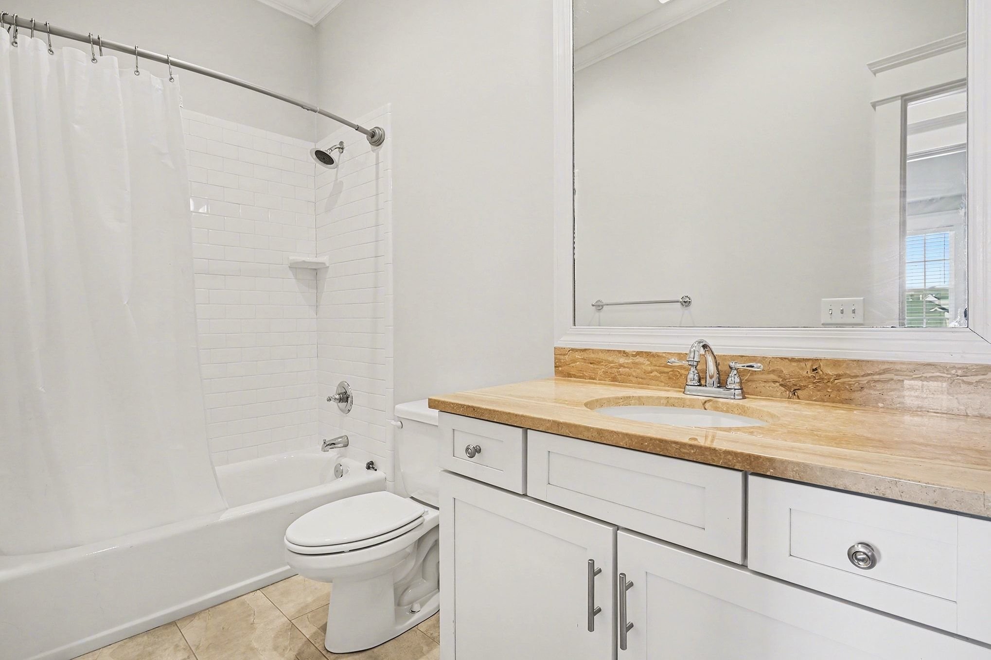 1815 A Shackleford Road Nashville, TN 37215 - Photo 25 of 39 a bathroom with a granite countertop sink a toilet and shower