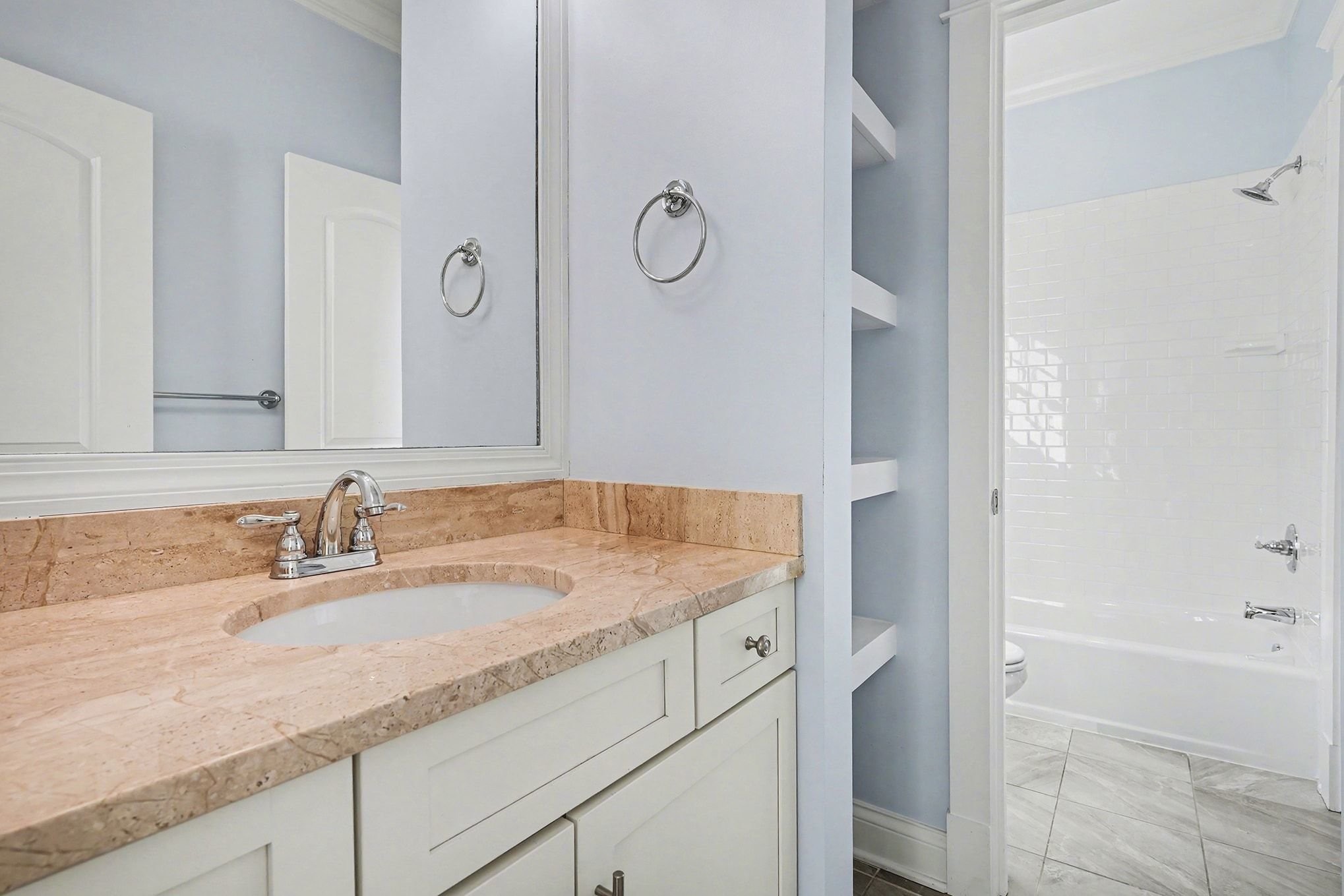 1815 A Shackleford Road Nashville, TN 37215 - Photo 29 of 39 a bathroom with a granite countertop sink and a mirror