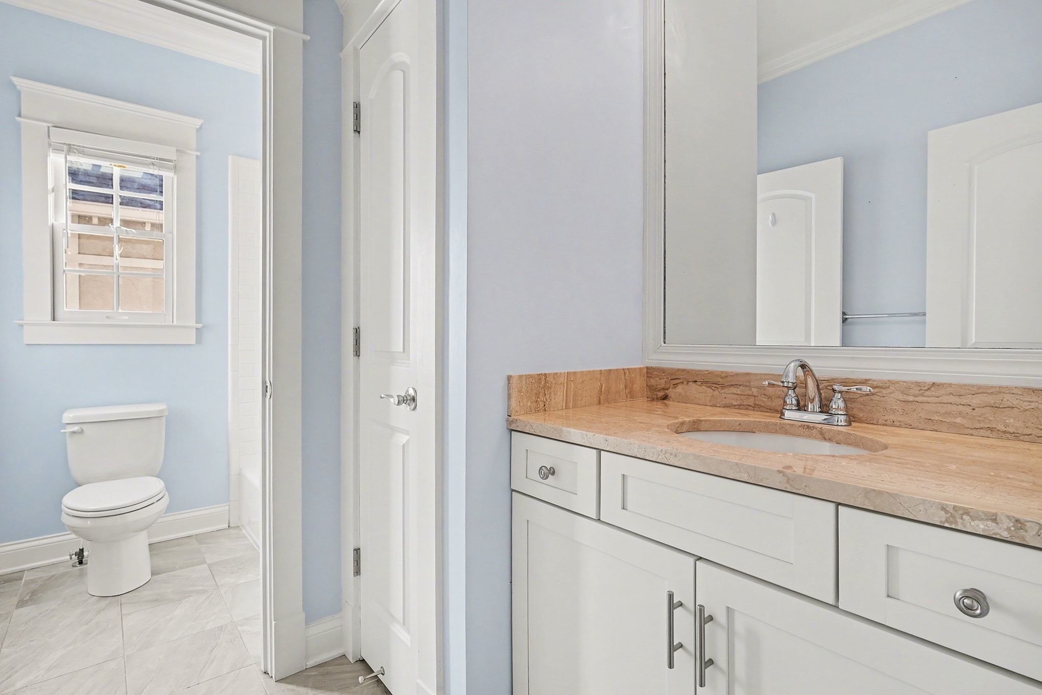 1815 A Shackleford Road Nashville, TN 37215 - Photo 31 of 39 a bathroom with a granite countertop sink a toilet and a mirror