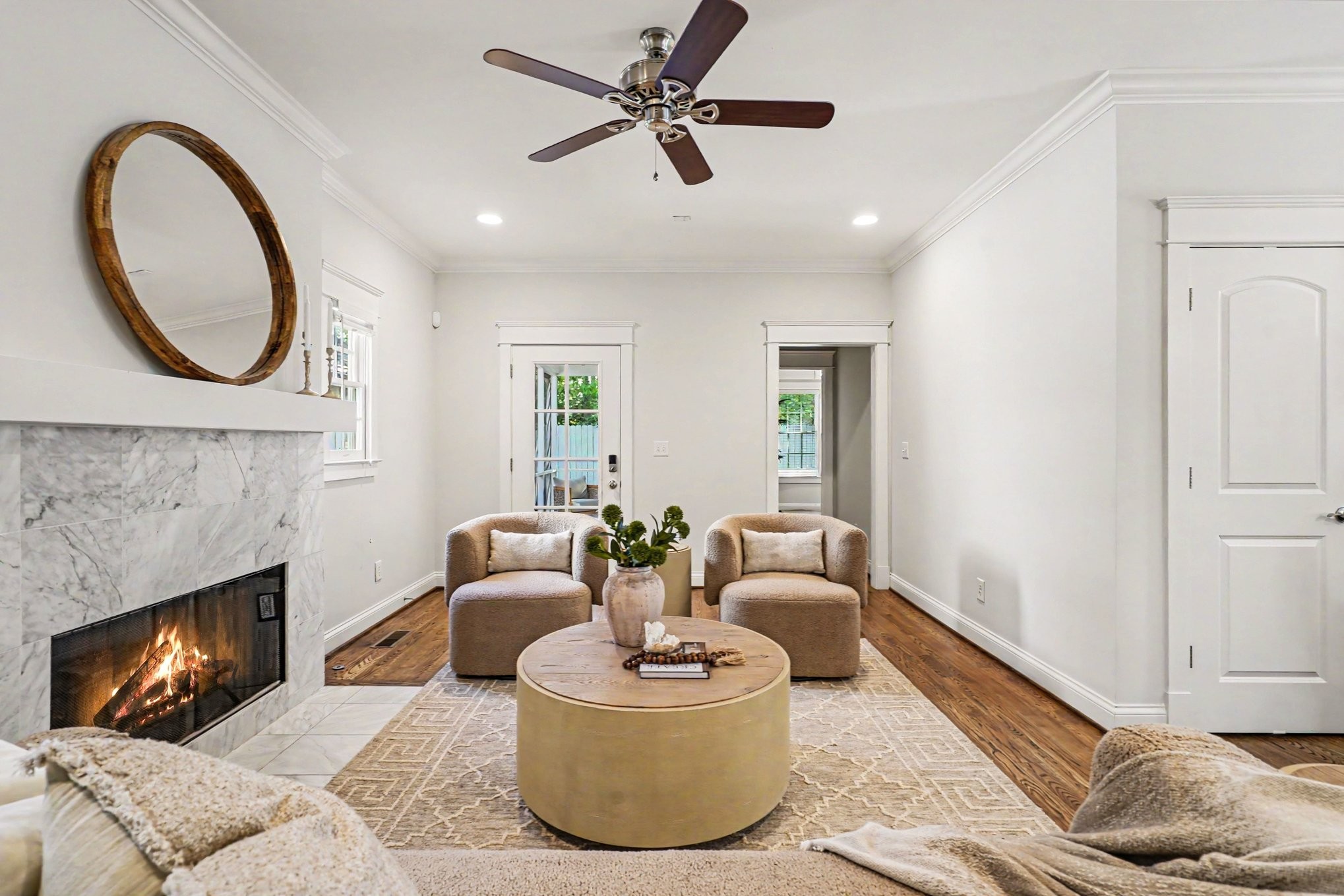 1815 A Shackleford Road Nashville, TN 37215 - Photo 5 of 39 a living room with furniture a fireplace and a chandelier
