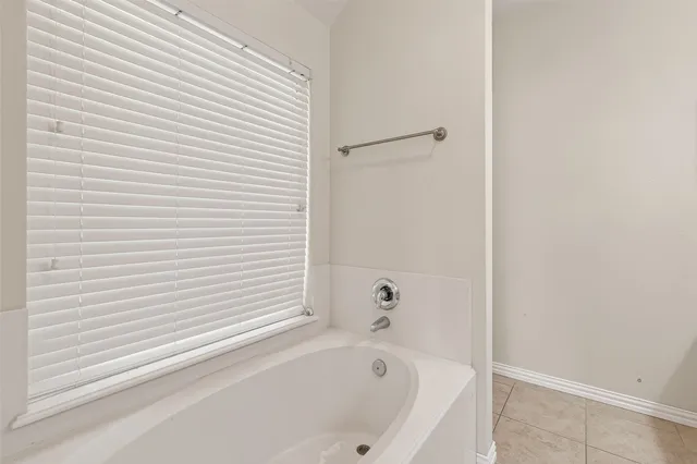 a bathroom with a bathtub