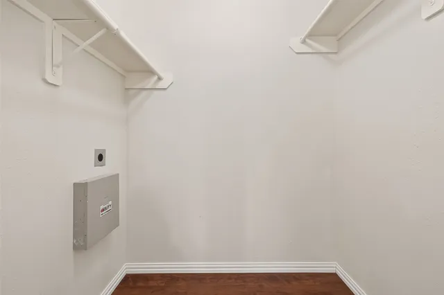 a view of small space with racks on the wall