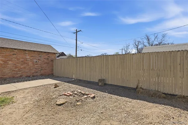 a view of a backyard of the house