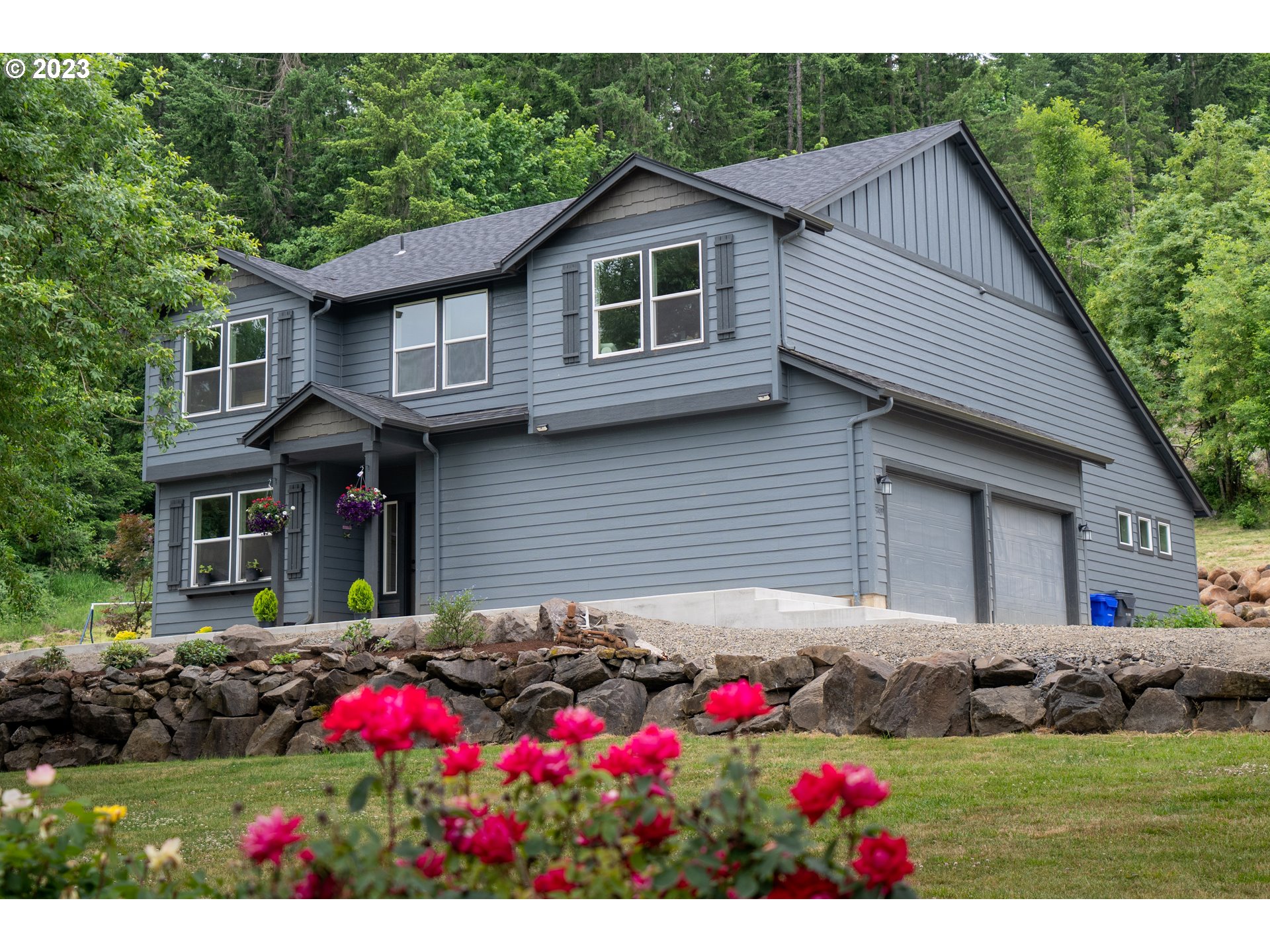 37489 South Wilhoit Road Molalla, OR 97038 - Photo 1 of 38 a view of a house with a yard and garden