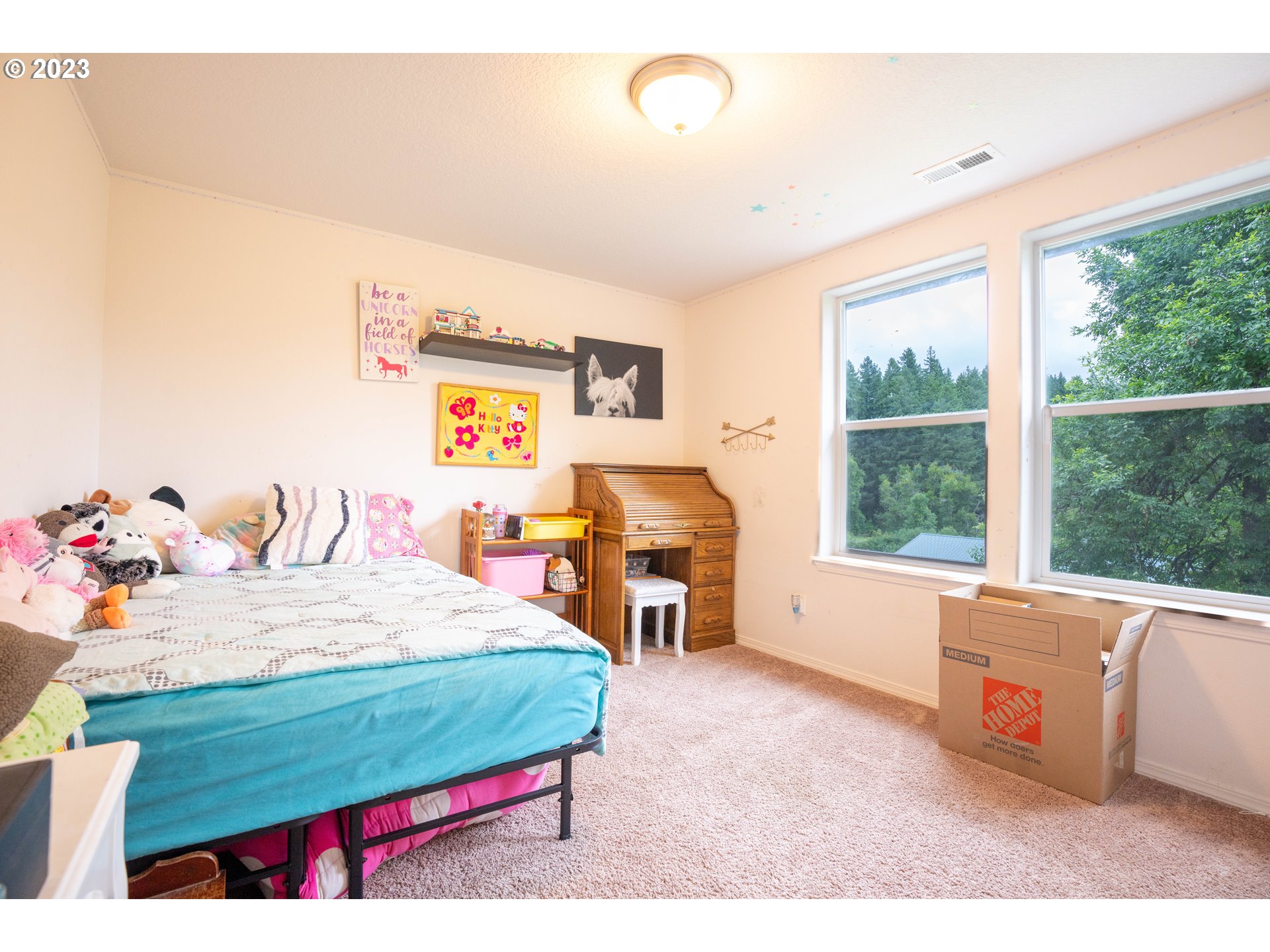 37489 South Wilhoit Road Molalla, OR 97038 - Photo 20 of 38 a bed room with a bed and a large window