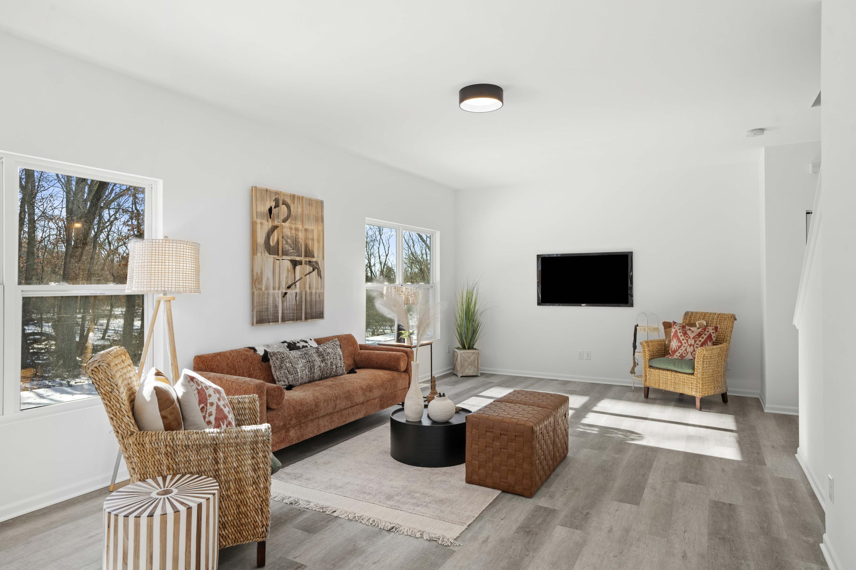 10395 California Street Crown Point, IN 46307 - Photo 2 of 21 a living room with furniture and a flat screen tv
