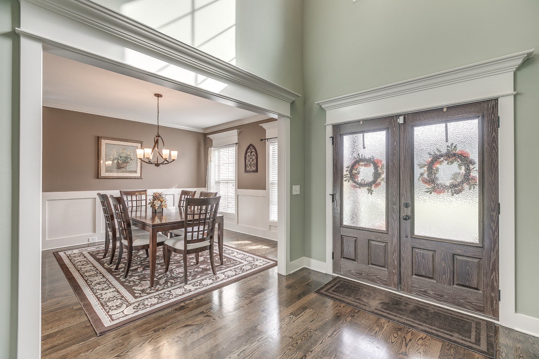 8478 Newtown Road Rockvale, TN 37153 - Photo 25 of 54 a view of a dining room with furniture wooden floor and a chandelier