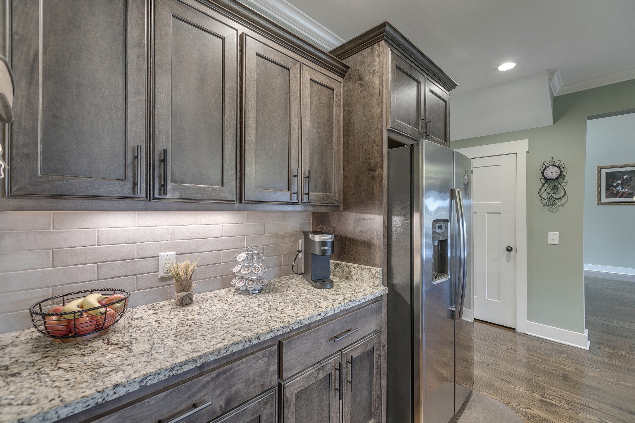 8478 Newtown Road Rockvale, TN 37153 - Photo 33 of 54 a kitchen with granite countertop cabinets and stainless steel appliances