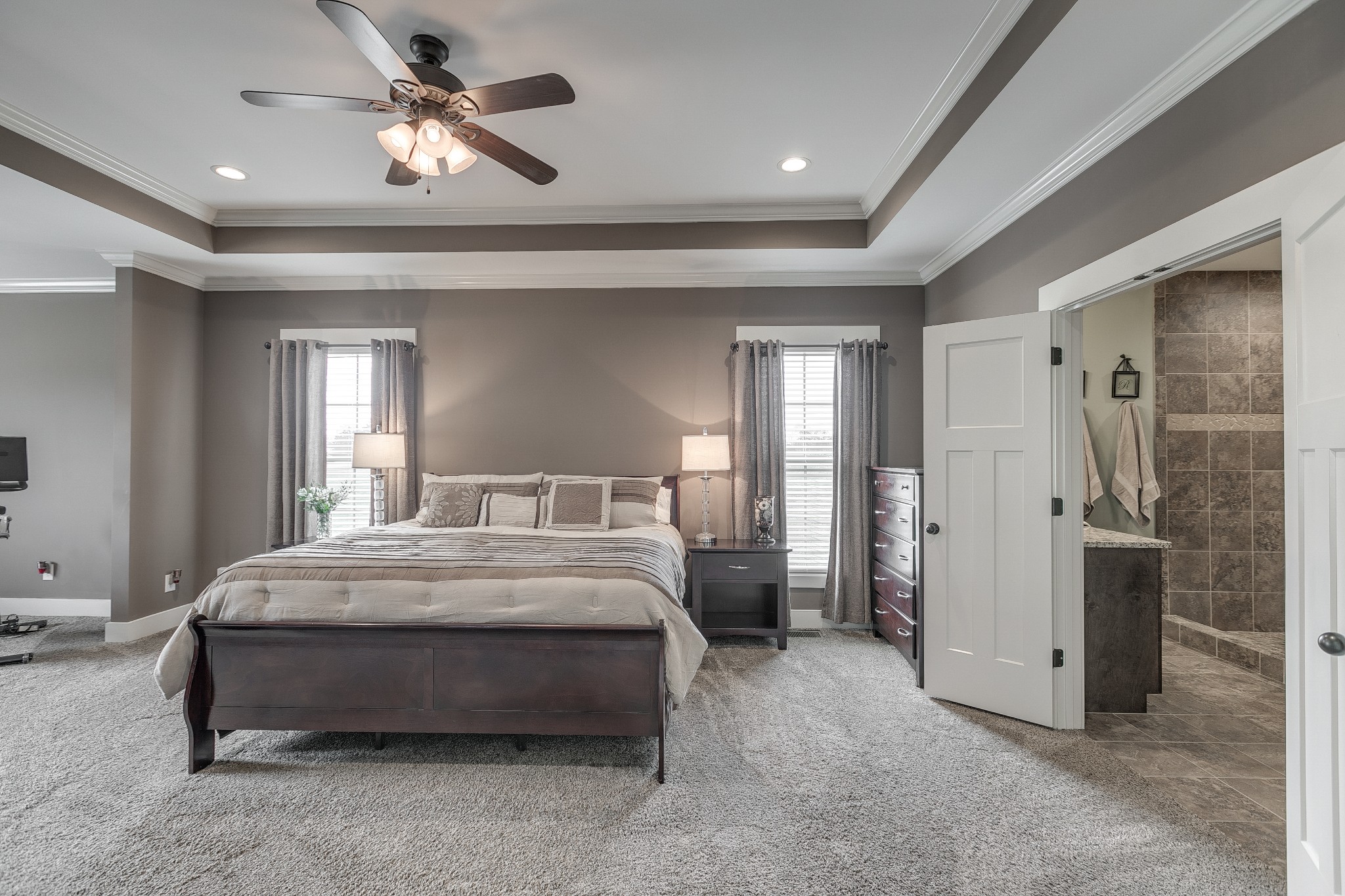 8478 Newtown Road Rockvale, TN 37153 - Photo 38 of 54 a bedroom with bed and a chandelier