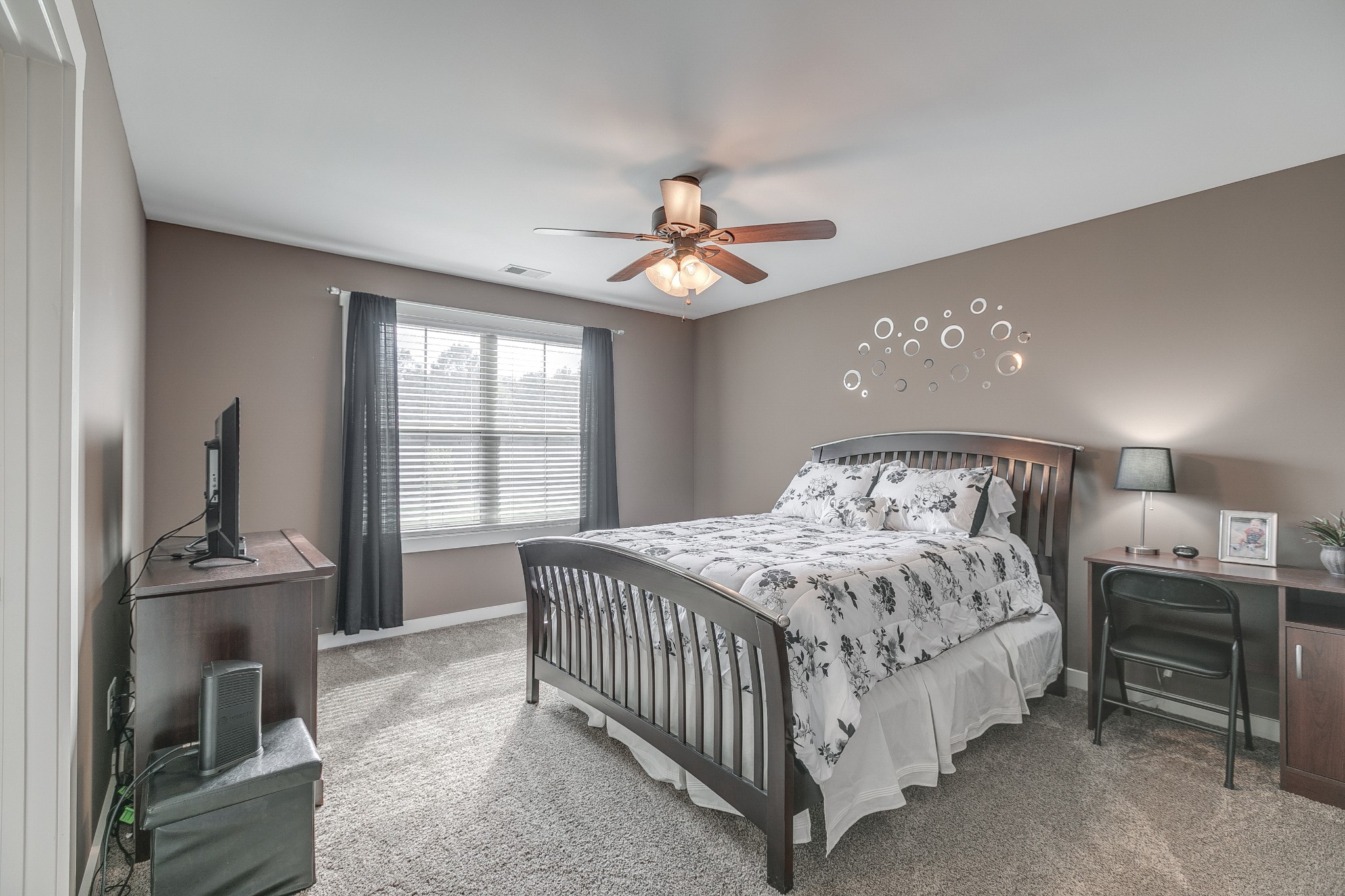 8478 Newtown Road Rockvale, TN 37153 - Photo 46 of 54 a bedroom with a bed and a chandelier