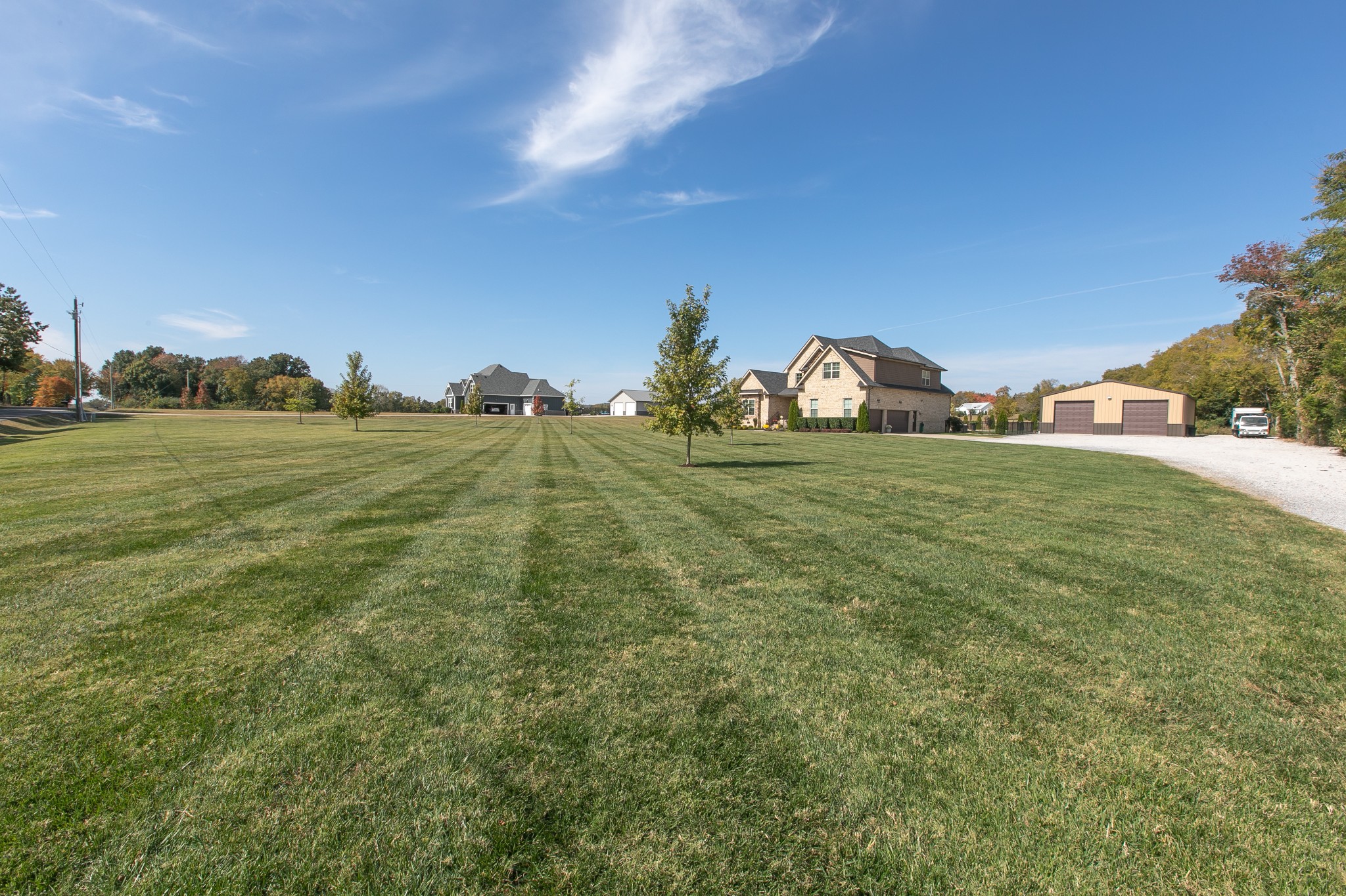 8478 Newtown Road Rockvale, TN 37153 - Photo 5 of 54 a view of a field with an trees in the background