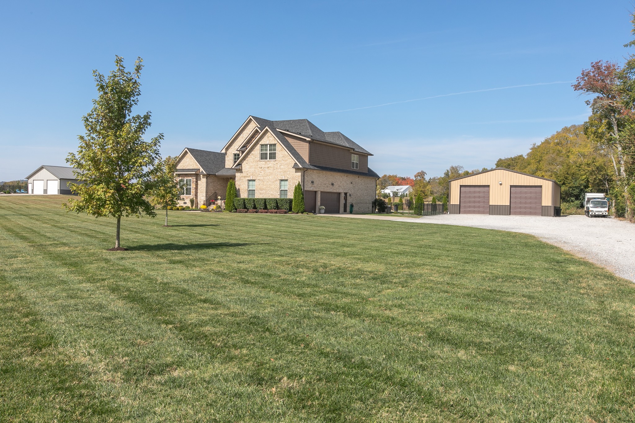 8478 Newtown Road Rockvale, TN 37153 - Photo 6 of 54 a front view of a house with a yard