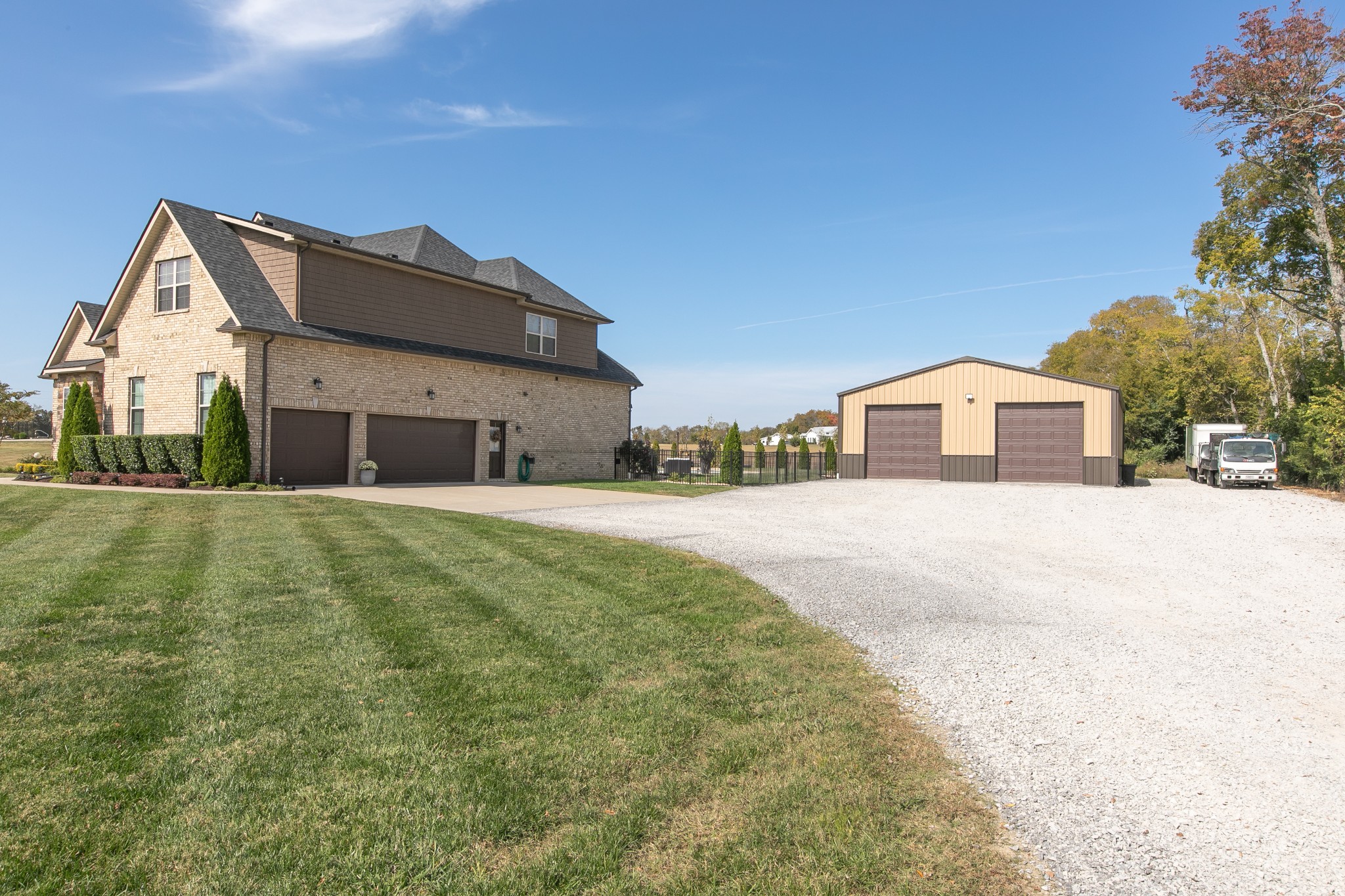 8478 Newtown Road Rockvale, TN 37153 - Photo 7 of 54 a front view of a house with a yard