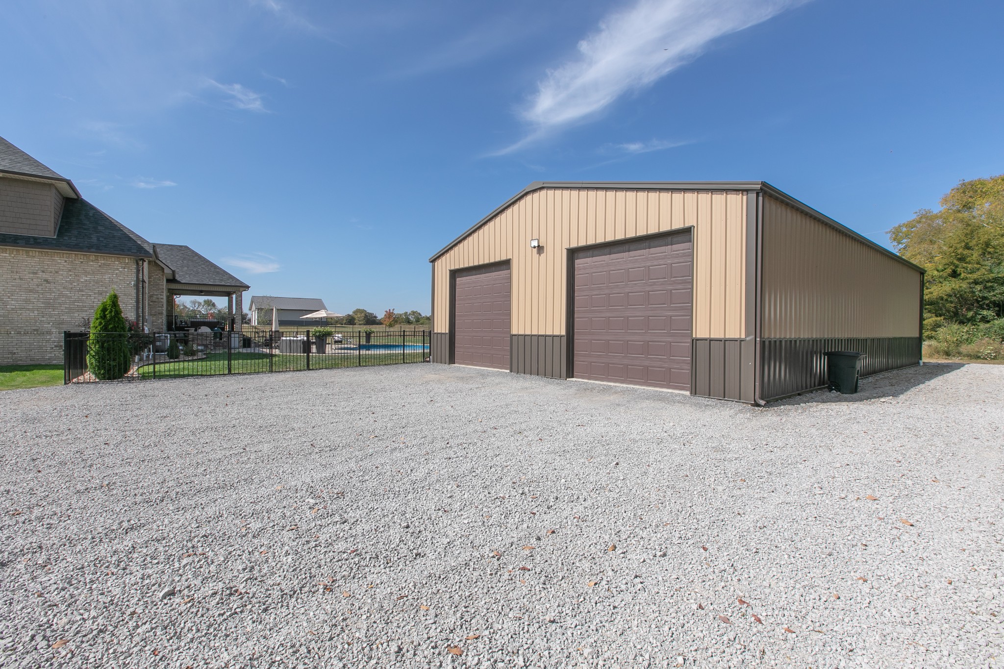 8478 Newtown Road Rockvale, TN 37153 - Photo 10 of 54 a view of a house with a yard and garage
