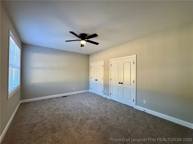 an empty room with a empty space and a window