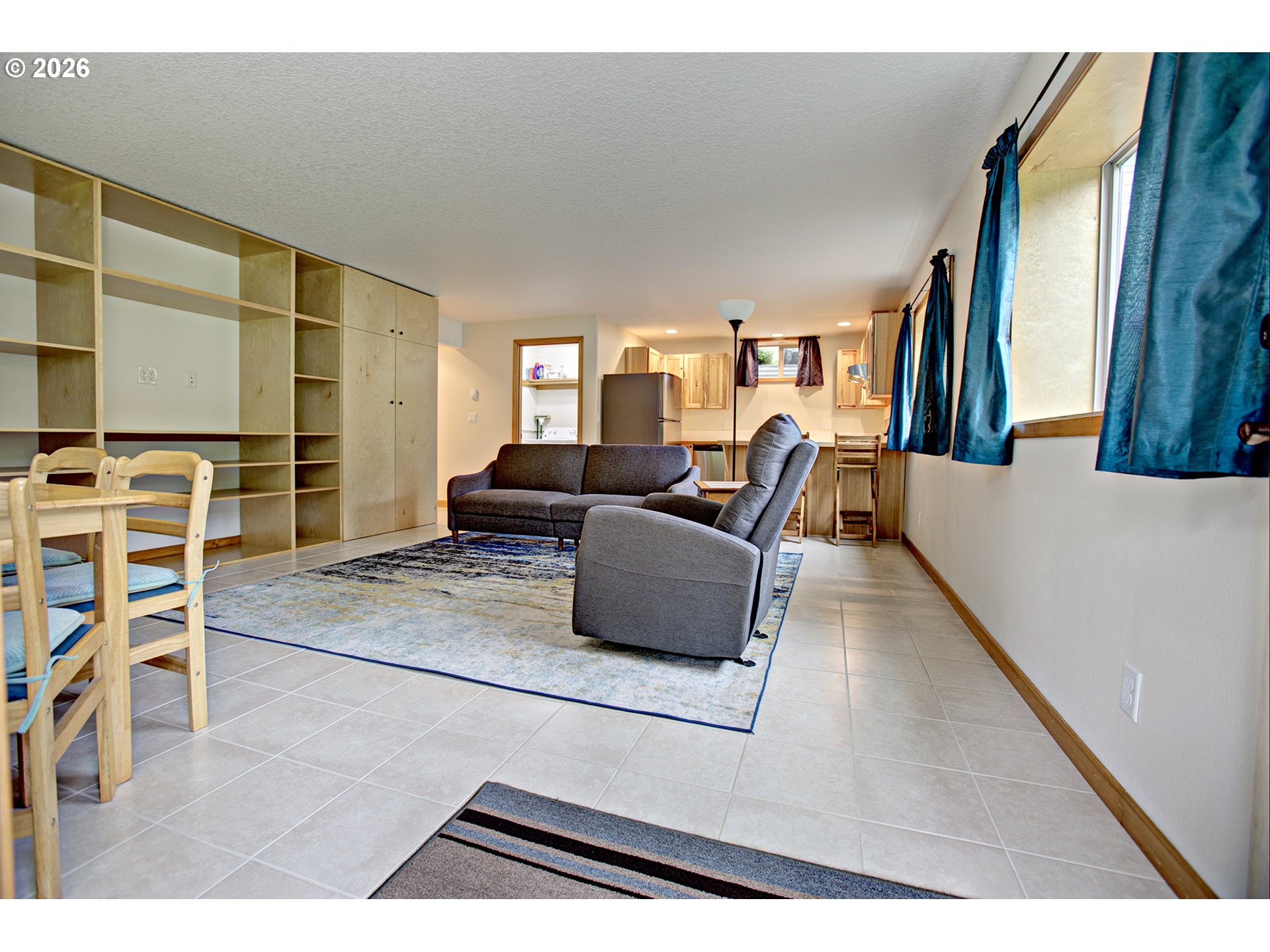 60300 Rays Way St. Helens, OR 97051 - Photo 26 of 41 a living room with furniture and a flat screen tv