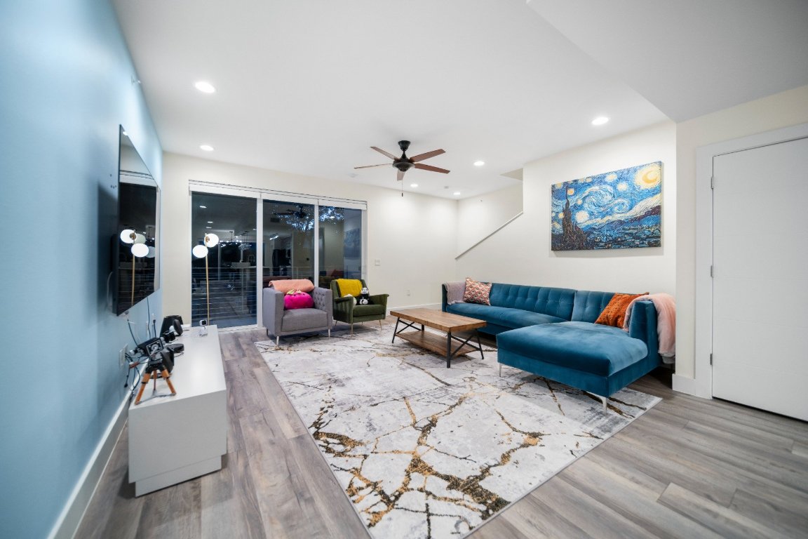 604 North Bluff Drive, Unit 247 Austin, TX 78745 - Photo 14 of 23 Living area featuring wood finished floors, ceiling fan, and recessed lighting