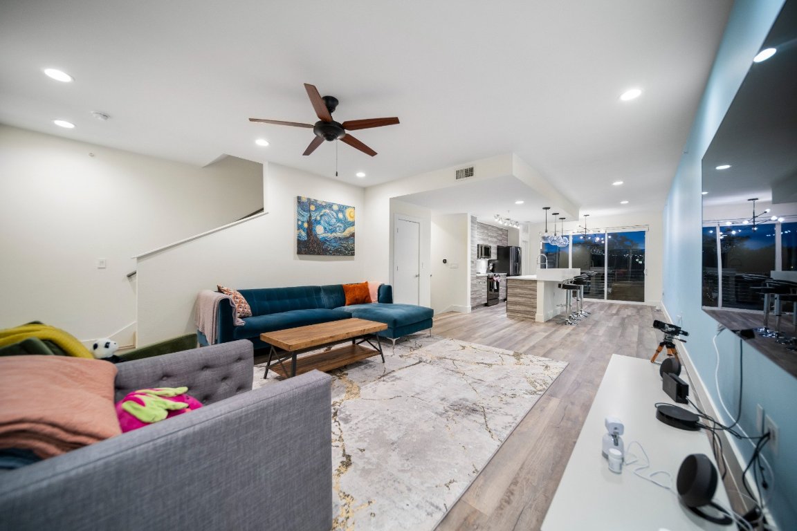 604 North Bluff Drive, Unit 247 Austin, TX 78745 - Photo 15 of 23 Living room featuring light wood-style floors, ceiling fan, and recessed lighting