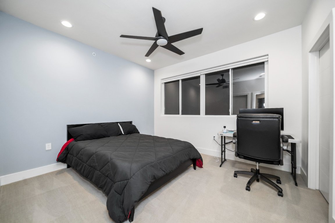 604 North Bluff Drive, Unit 247 Austin, TX 78745 - Photo 18 of 23 Carpeted bedroom with recessed lighting and a ceiling fan