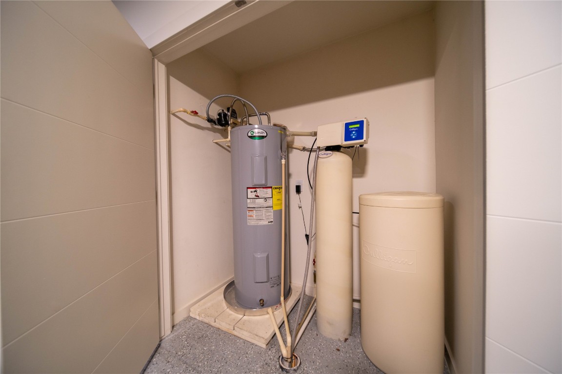 604 North Bluff Drive, Unit 247 Austin, TX 78745 - Photo 23 of 23 Utility room with electric water heater