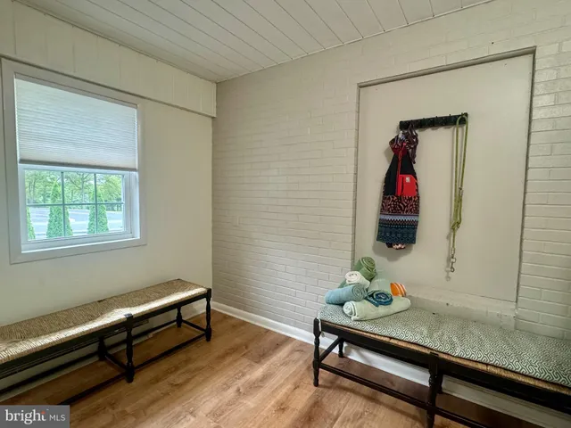 a room with furniture and window