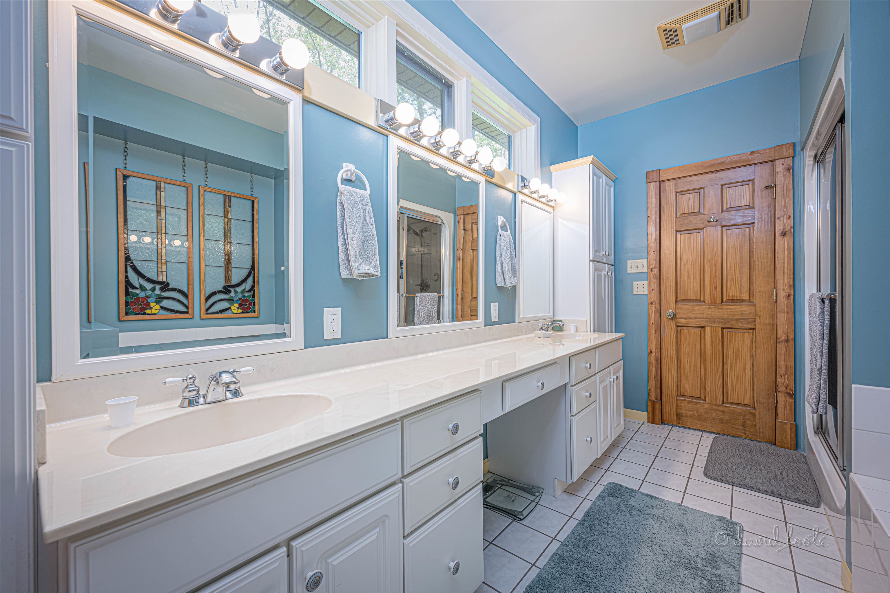 108 West Glen Hollow Road Galena, IL 61036 - Photo 22 of 51 a bathroom with a sink and a mirror