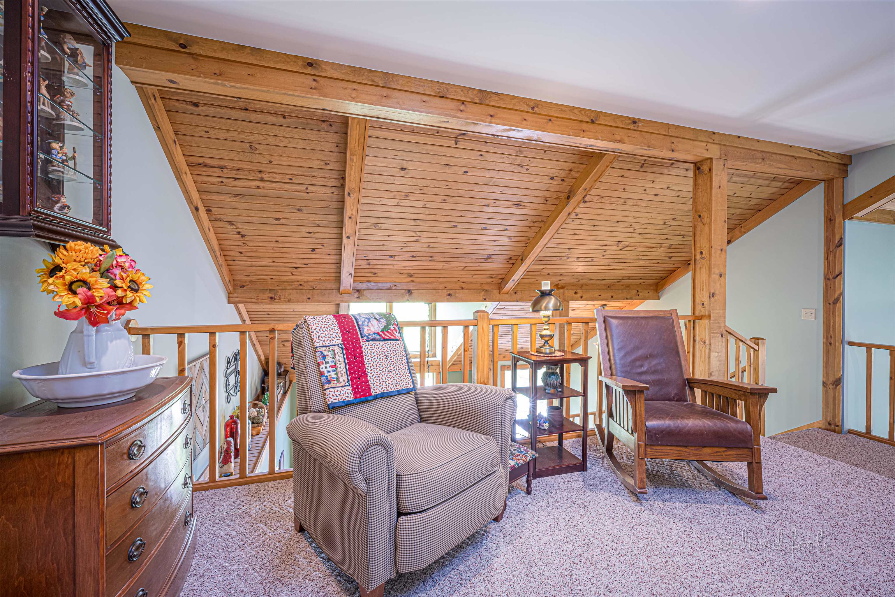 108 West Glen Hollow Road Galena, IL 61036 - Photo 27 of 51 a living room with furniture and a chandelier