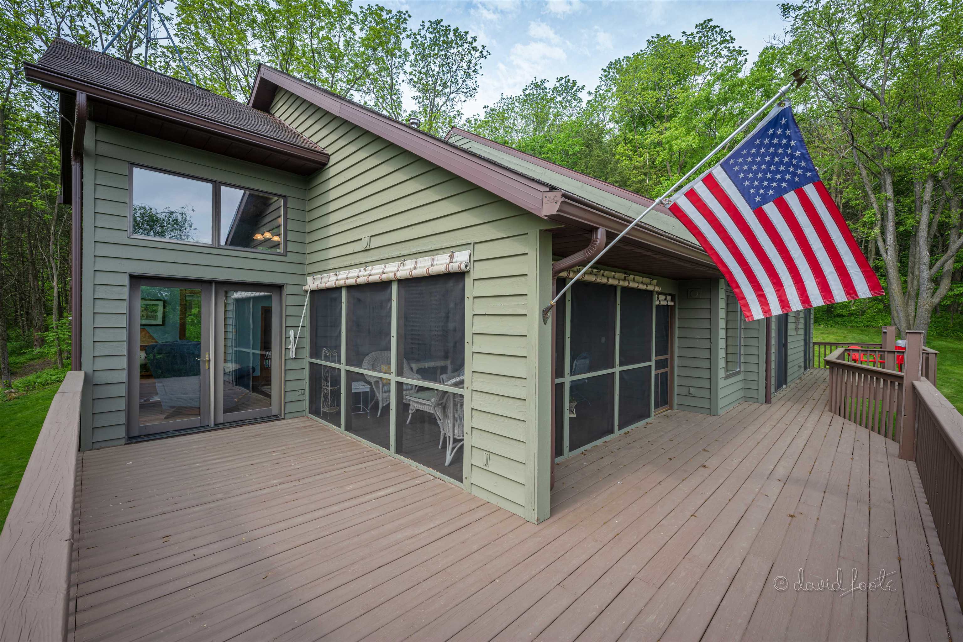 108 West Glen Hollow Road Galena, IL 61036 - Photo 42 of 51 a house with wooden floor and fence