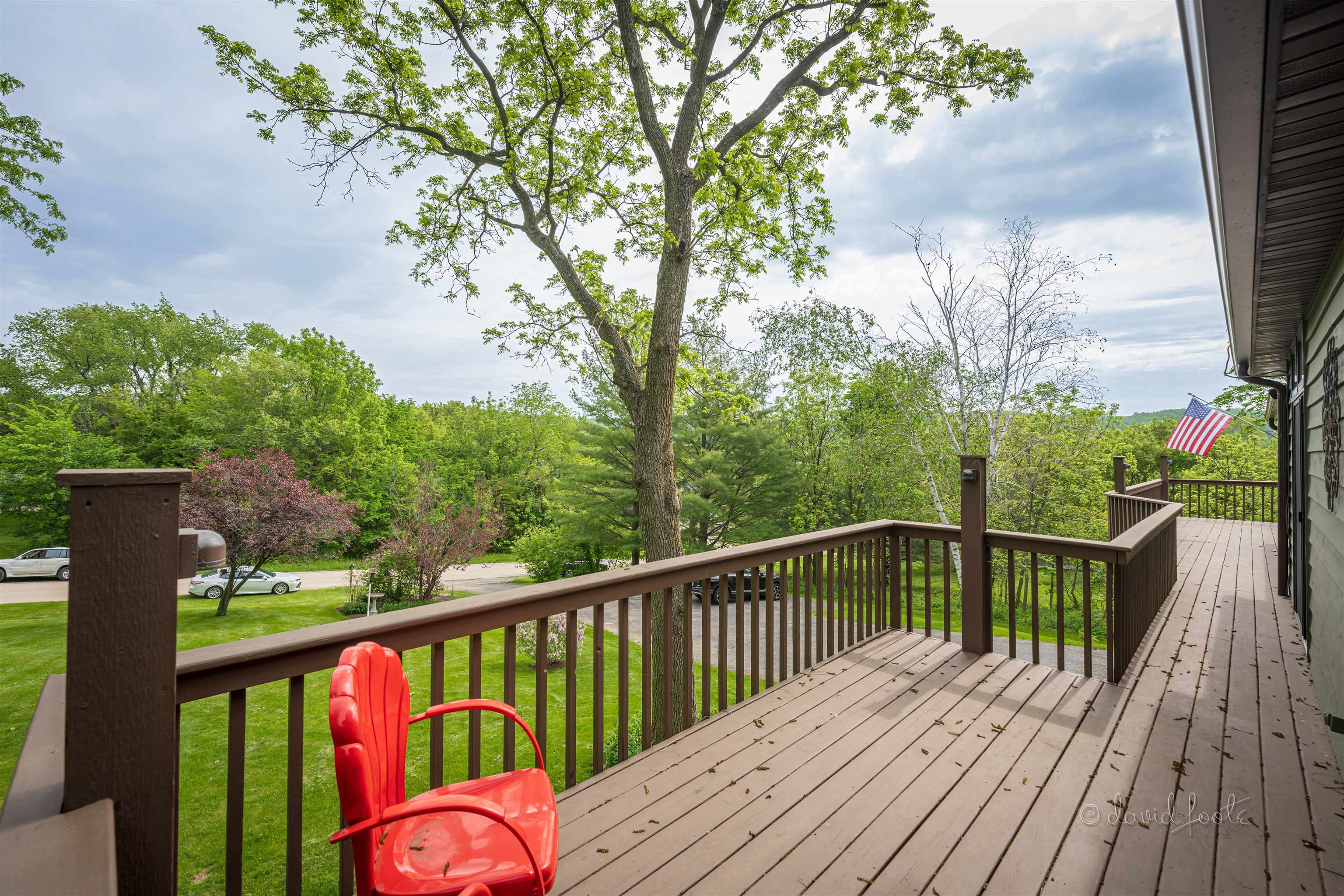 108 West Glen Hollow Road Galena, IL 61036 - Photo 45 of 51 a balcony with wooden floor and outdoor seating