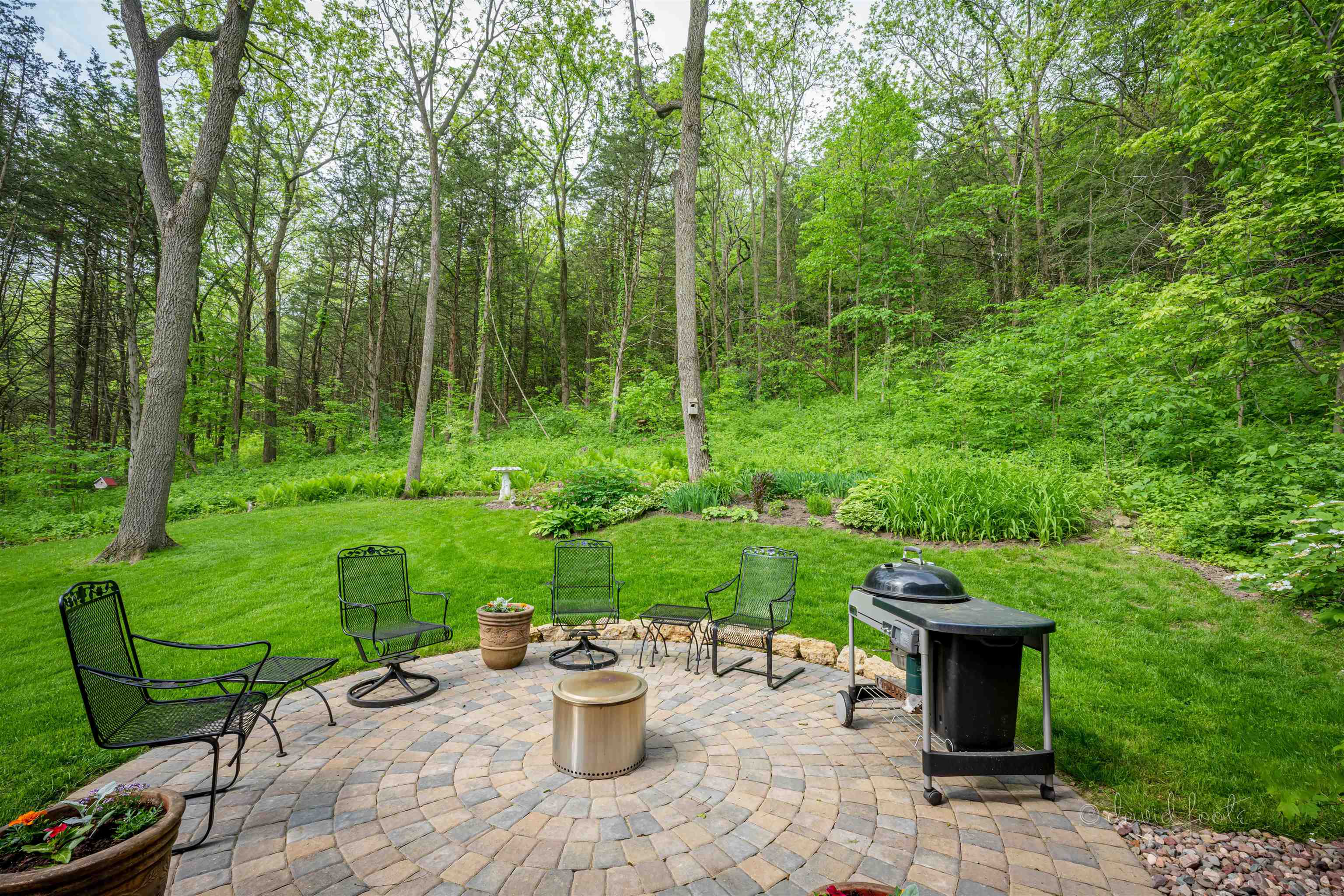 108 West Glen Hollow Road Galena, IL 61036 - Photo 49 of 51 a view of a backyard with sitting area and garden